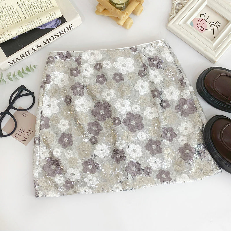 Mini-jupe fourreau fleurie pour femme