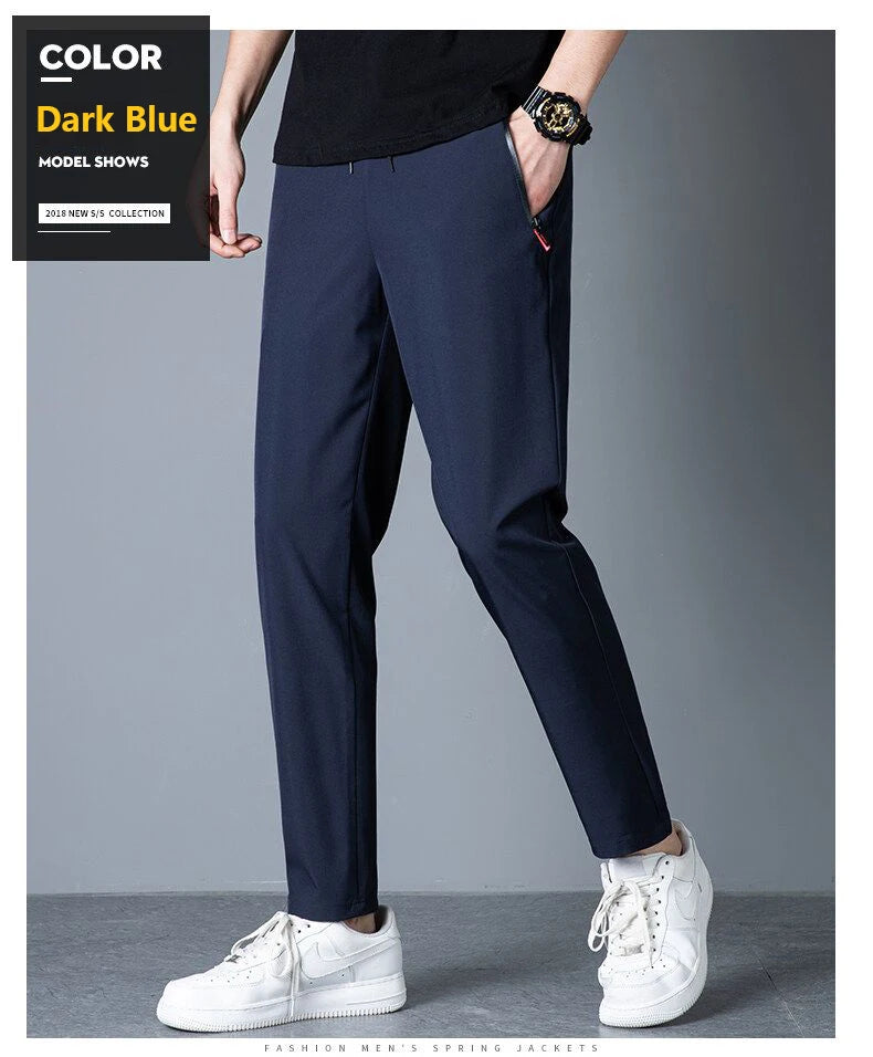 Men's casual pants straight leg slim fit elastic waist jogging pants Korean classic blue black gray men's pants plus size 4XL5XL