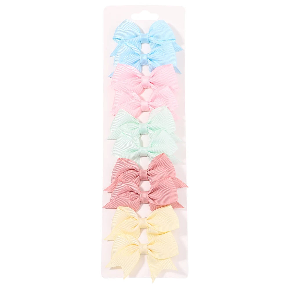 Lot de 10 pinces à cheveux unies avec nœuds pour bébés filles, barrettes à nœuds faites à la main, accessoires capillaires pour le Nouvel An