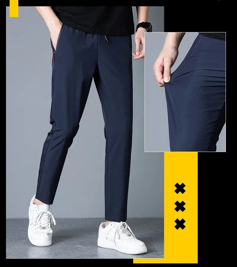 Men's casual pants straight leg slim fit elastic waist jogging pants Korean classic blue black gray men's pants plus size 4XL5XL