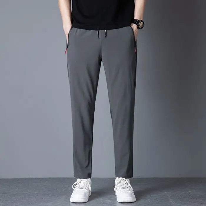 Men's casual pants straight leg slim fit elastic waist jogging pants Korean classic blue black gray men's pants plus size 4XL5XL