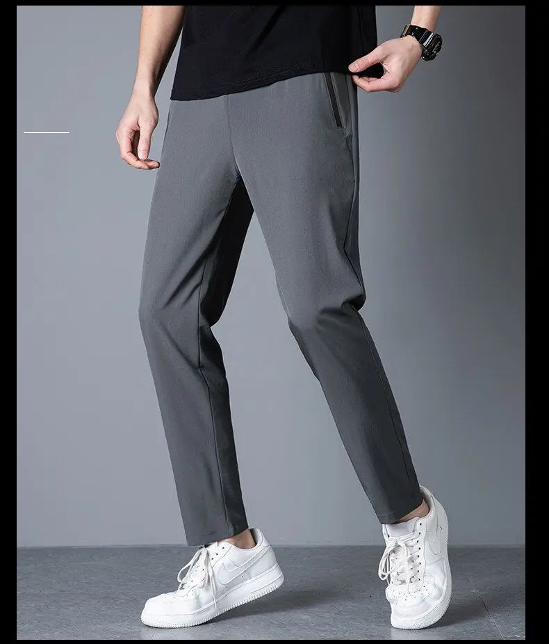 Men's casual pants straight leg slim fit elastic waist jogging pants Korean classic blue black gray men's pants plus size 4XL5XL