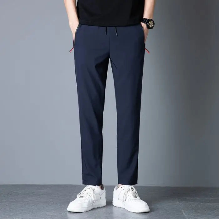 Men's casual pants straight leg slim fit elastic waist jogging pants Korean classic blue black gray men's pants plus size 4XL5XL