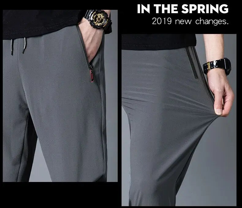 Men's casual pants straight leg slim fit elastic waist jogging pants Korean classic blue black gray men's pants plus size 4XL5XL