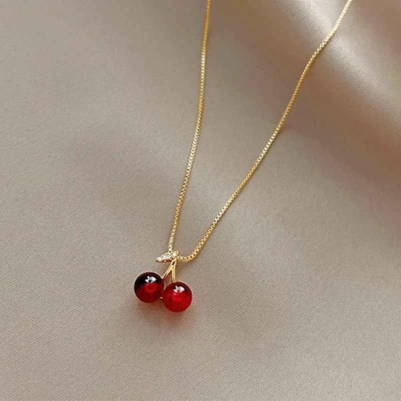 The 2025 summer classic sweet wine red cherry pendant necklace is a fashionable and individual fruit golden chain necklace for w