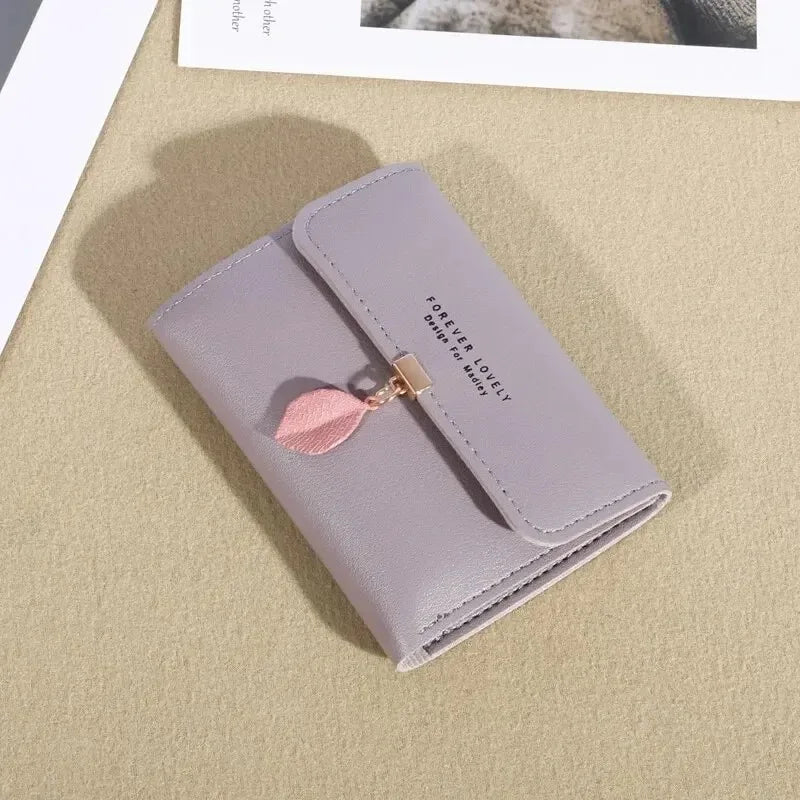 Neue koreanische Version der einfachen kleinen Geldbörse, dreifach faltbar, Münzfach, Geldscheinklammer, Münztasche, Cross-Border Kurzdamen-Geldbörse