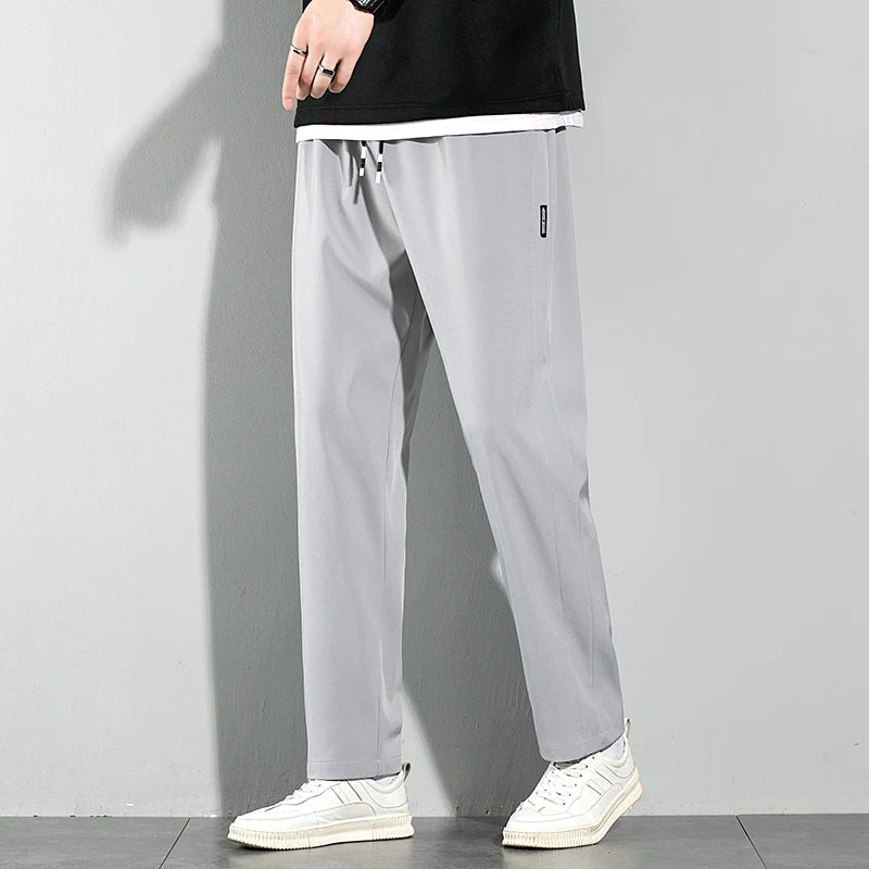 Herren Eisseide-Hose 2025 Sommer Neu Schwarz Grau Dünne Business-Freizeithose Outdoor Elastisch Atmungsaktiv Gerades Bein Jogginghose