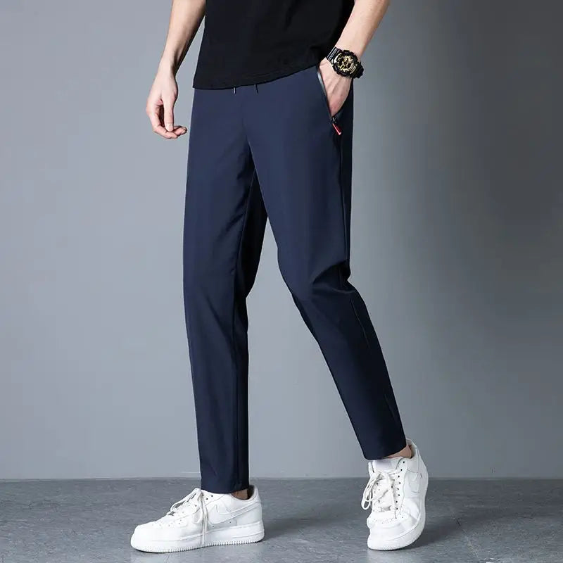 Men's casual pants straight leg slim fit elastic waist jogging pants Korean classic blue black gray men's pants plus size 4XL5XL