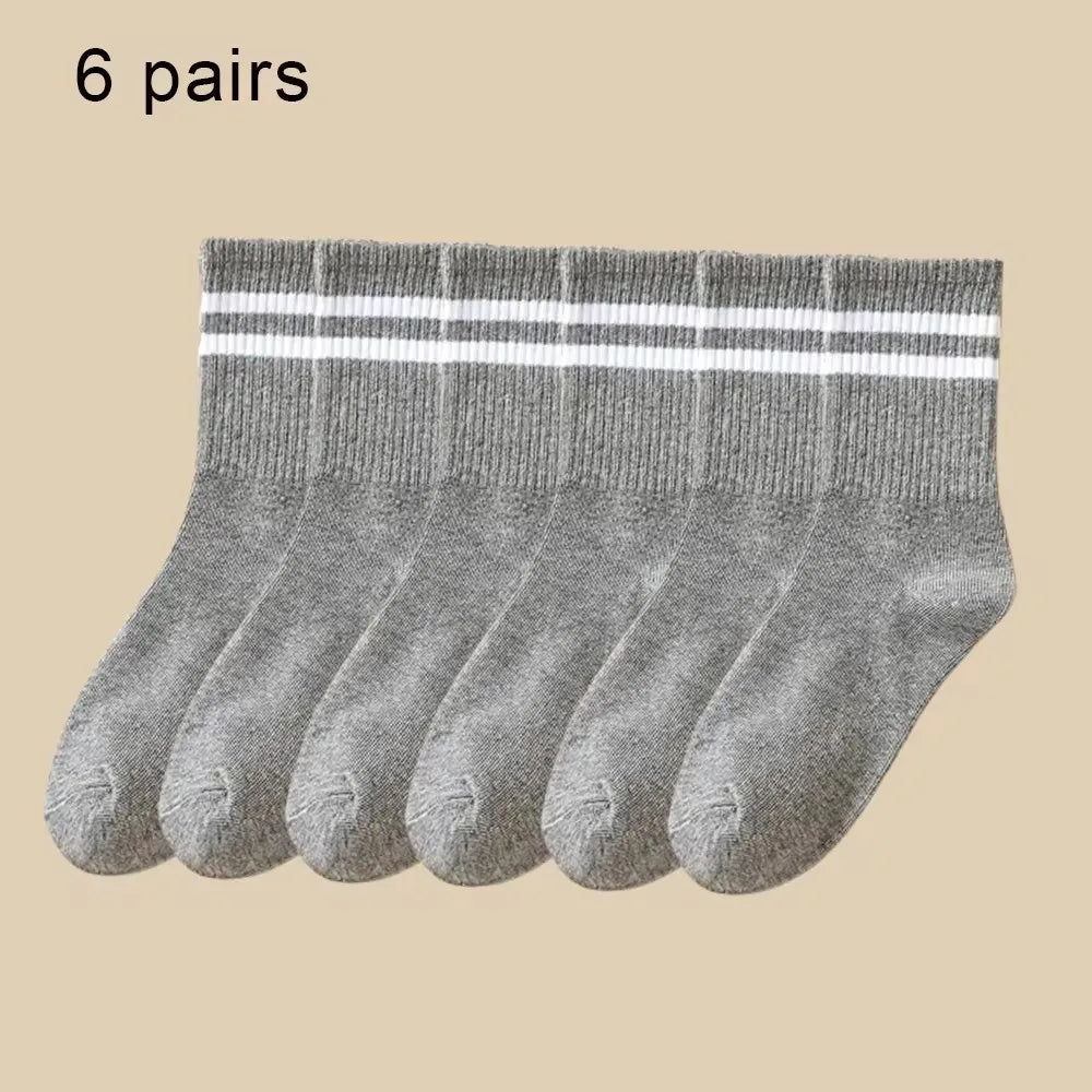 Lot de 6 paires de chaussettes hautes mi-mollet pour femme, noir et blanc pur, avec rayures parallèles, populaires et absorbantes.
