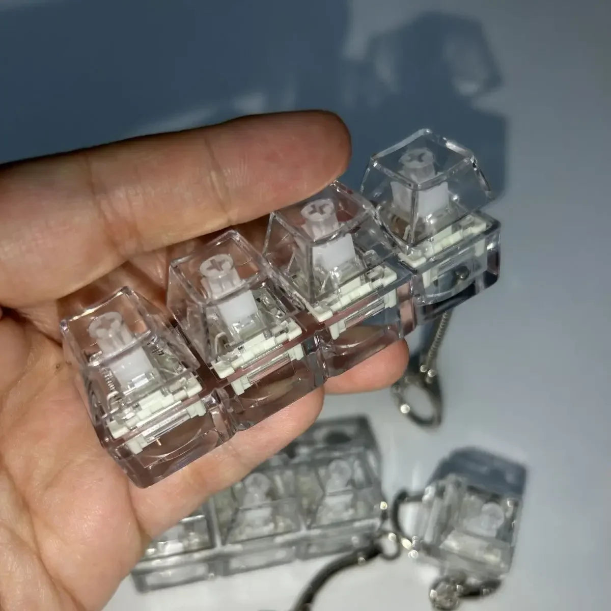 Keychain LED lights for relieving stress and anxiety, keychain keyboard toys, portable office desk accessories, office gifts